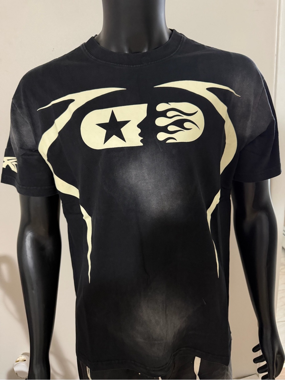 Men's Black Graphic Tee with Cream Emblem